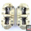 Pinze freno radiali triple bridge Brembo oro interasse 100mm Ducati